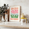 Colorful flowers in a groovy style with brown and green tones - styled on a counter with eucalyptus and a bowl of lemons