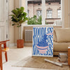 A minimalist poster featuring a bowl of noodles in gray and green tones - in a Parisian living room with a sofa and a fig plant