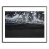 A tranquil ocean scene with soft green and blue hues - in a black frame