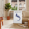 Illustration of various ocean animals in shades of blue and orange - in a Parisian living room with a sofa and a fig plant