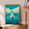 A sailor navigating a boat on the ocean, with orange and blue tones - beside a round wooden side table with books