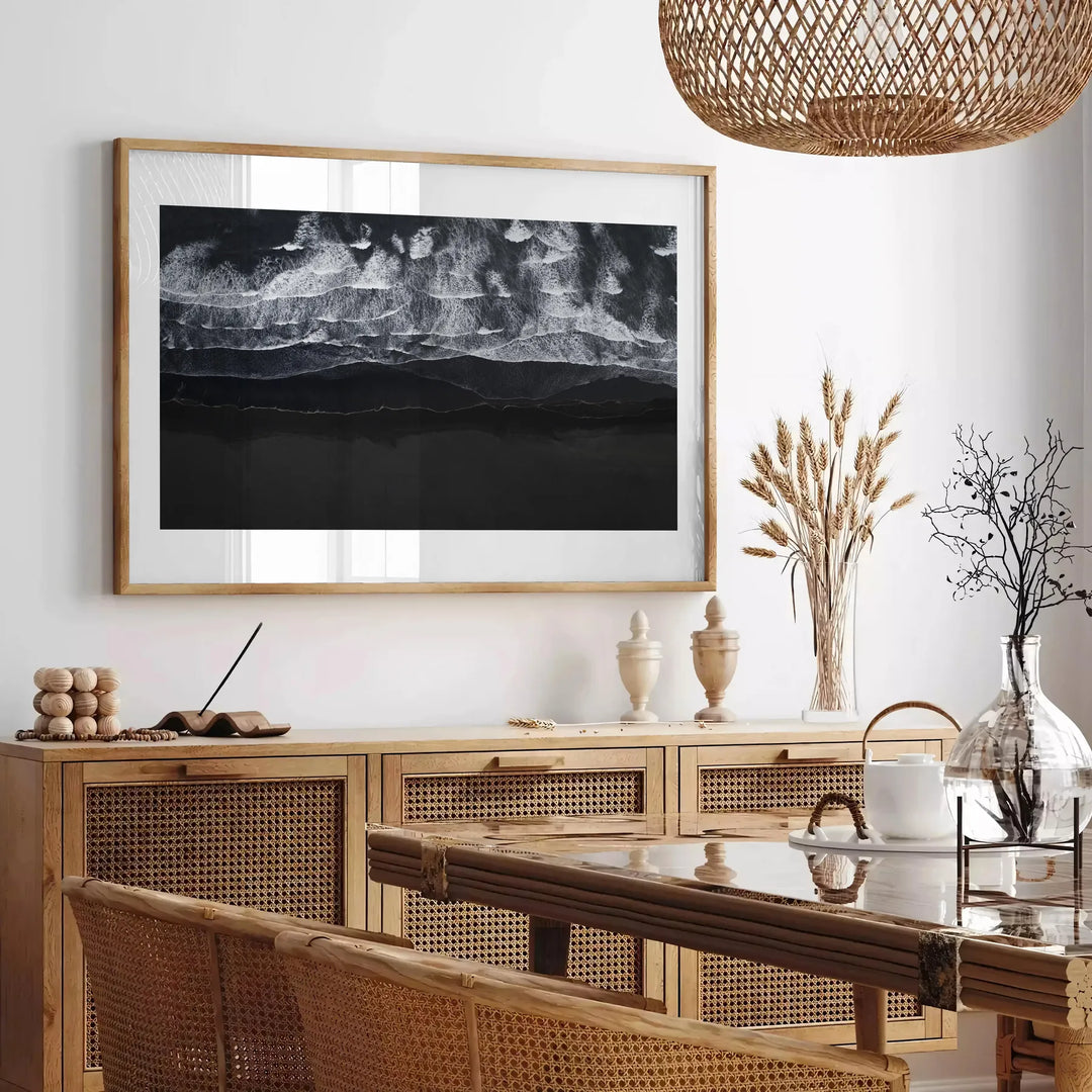 A tranquil ocean scene with soft green and blue hues - in a Parisian living room with a sofa and a fig plant