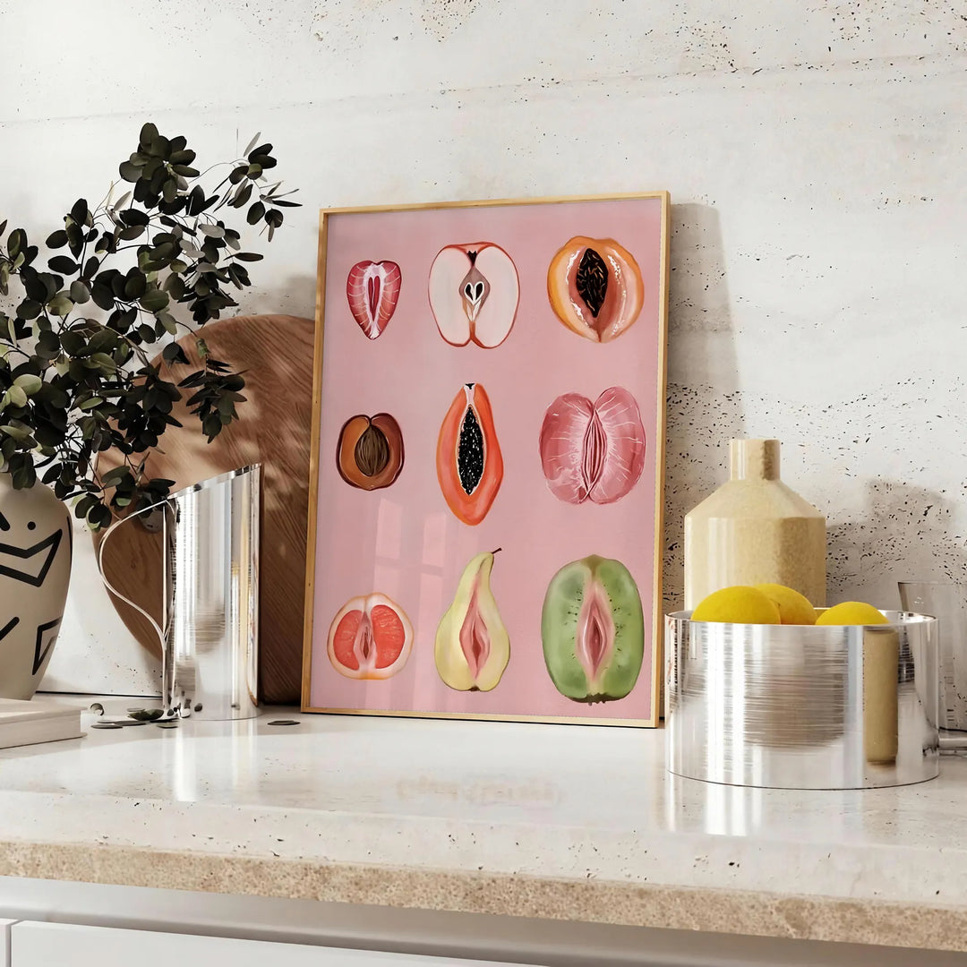 Graphic print of assorted fruits in bold black and brown tones - styled on a counter with eucalyptus and a bowl of lemons