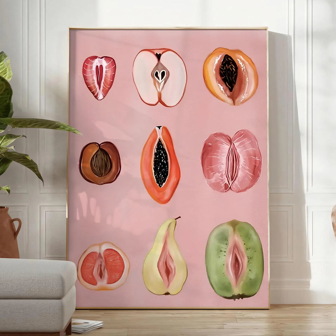 Graphic print of assorted fruits in bold black and brown tones - in a bright minimalist room with a plant and an armchair