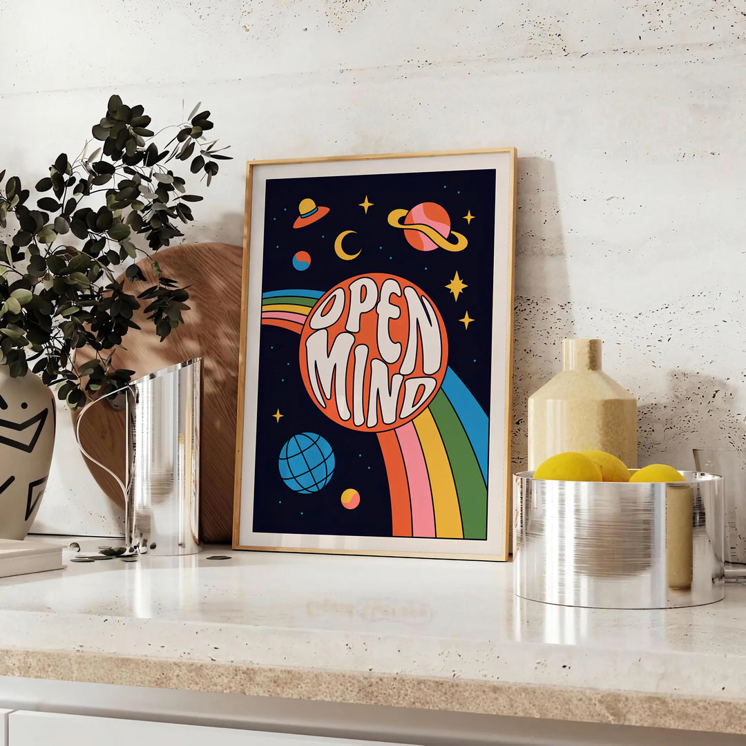 Abstract design featuring swirling orange and black shapes with a retro vibe - styled on a counter with eucalyptus and a bowl of lemons