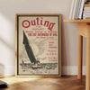 A tranquil boat gliding through calm waters, surrounded by gray and green hues - beside a round wooden side table with books
