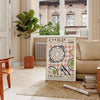 Illustration of oysters with green and orange hues, French kitchen theme - in a Parisian living room with a sofa and a fig plant