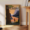 Illustration of the Pacific Northwest landscape with green forests and mountains - beside a round wooden side table with books