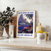 Vintage Pan American travel poster featuring a stylized airplane against a blue background - styled on a counter with eucalyptus and a bowl of lemons