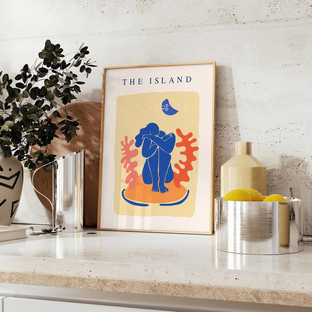 Papier découpé artwork featuring intricate cut-out designs in orange and blue - styled on a counter with eucalyptus and a bowl of lemons