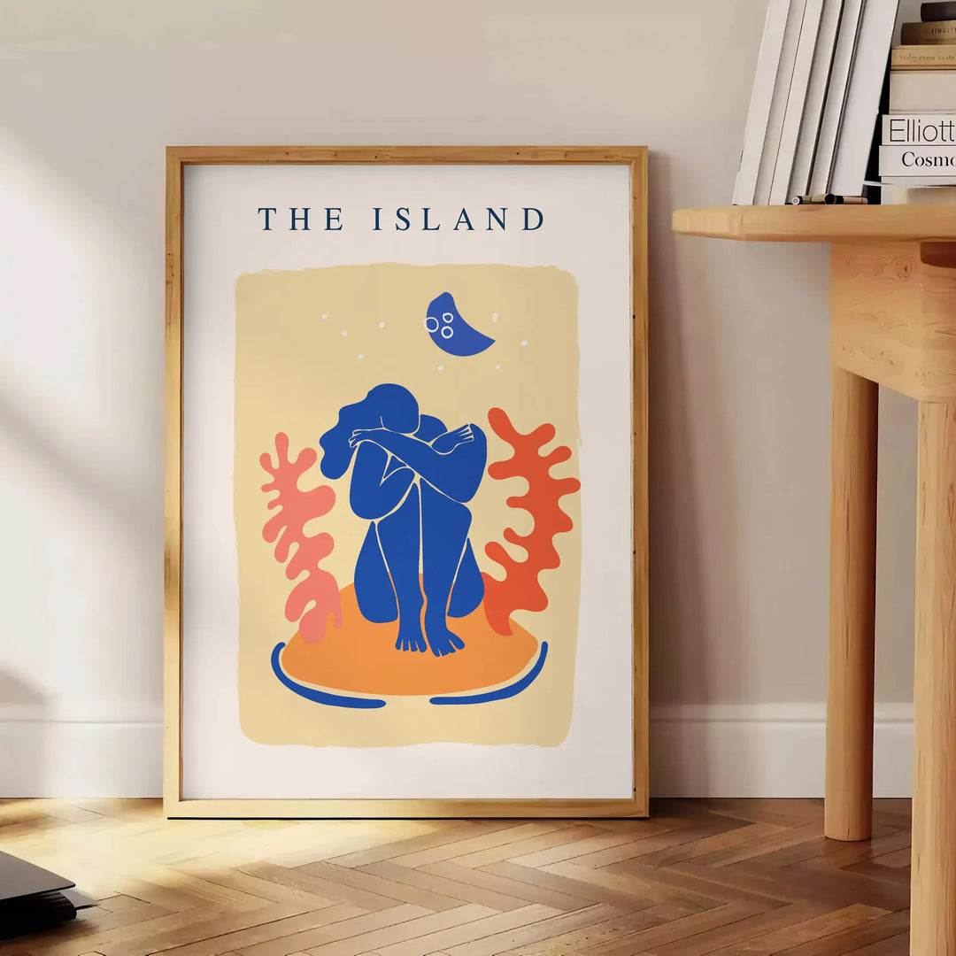 Papier découpé artwork featuring intricate cut-out designs in orange and blue - beside a round wooden side table with books