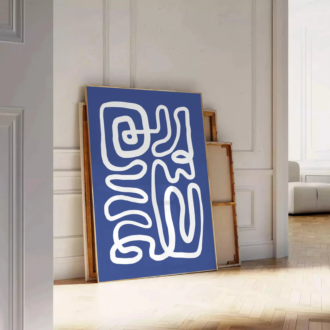 Gray and white space-themed poster featuring layered paper-cut artwork - leaning on a herringbone floor against a white panelled wall