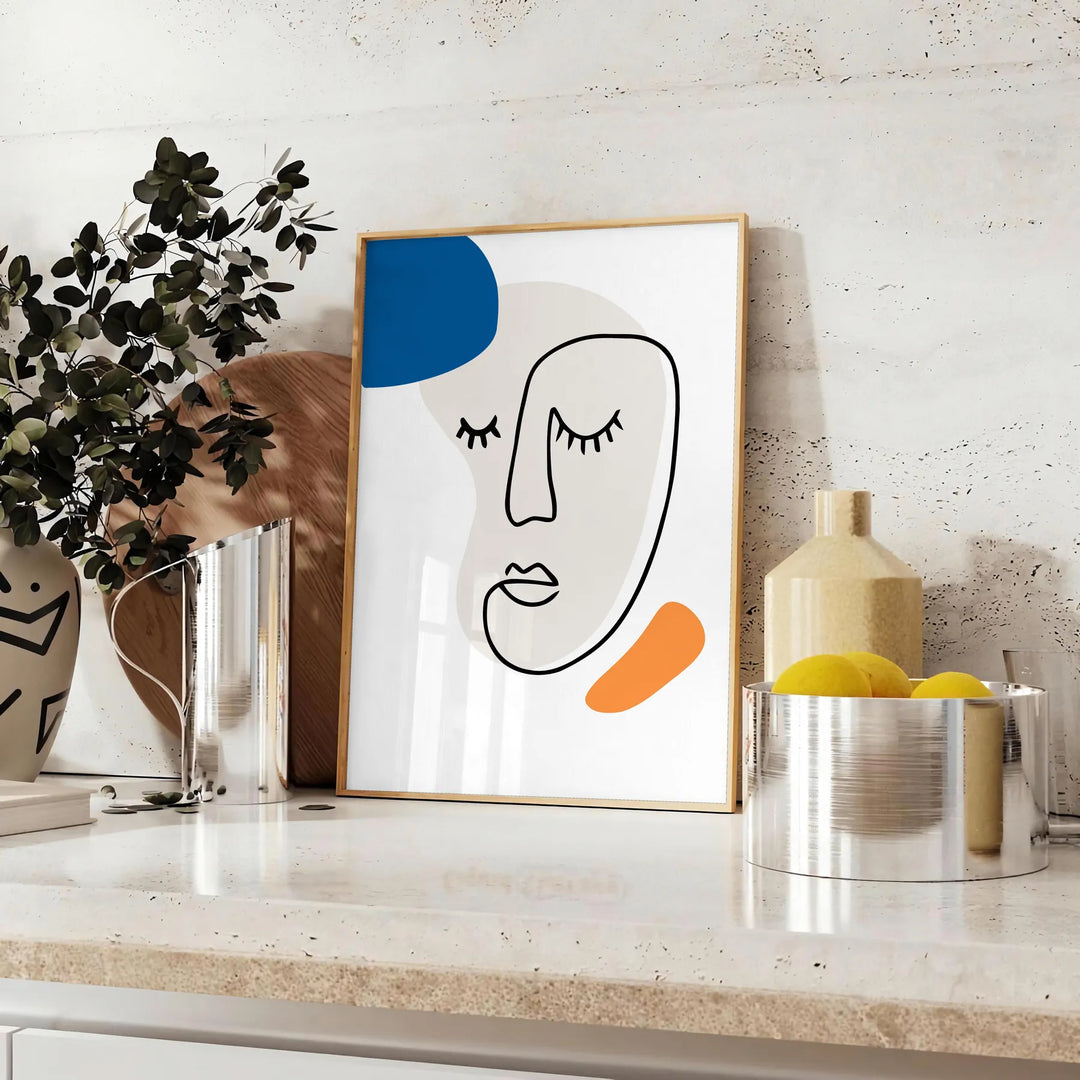 Paper-cut space collage poster in gray and white abstract design - styled on a counter with eucalyptus and a bowl of lemons