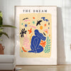 Abstract paper-cut design featuring layered orange and blue shapes - in a bright minimalist room with a plant and an armchair