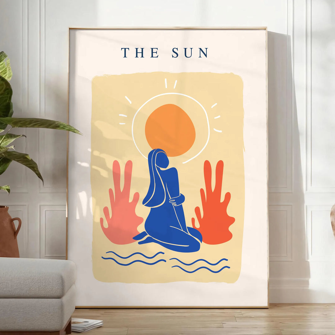 Poster showing layered papier découpé space artwork in orange and blue - in a bright minimalist room with a plant and an armchair