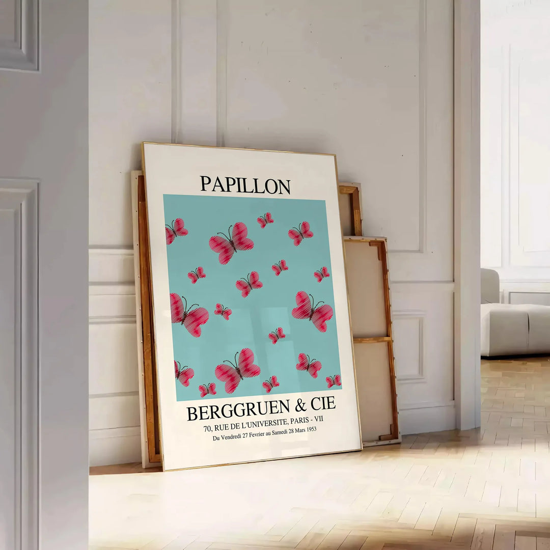Maximalist poster featuring a colorful butterfly against a dark background - leaning on a herringbone floor against a white panelled wall