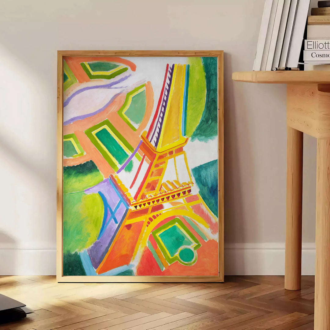 Graphic illustration of Paris with orange and blue tones - beside a round wooden side table with books