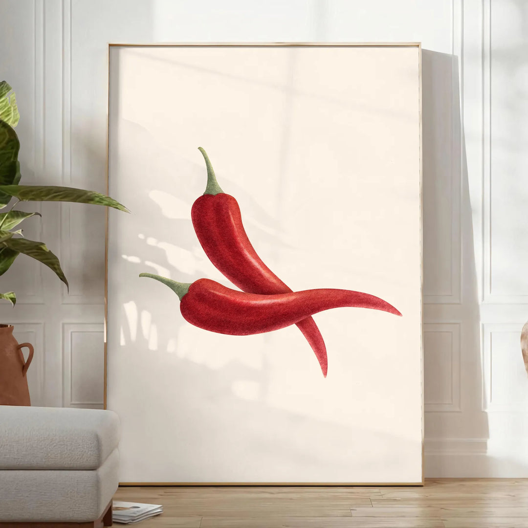 Una stampa moderna da cucina con peperoni rossi e grigi in un design stilizzato - in una stanza luminosa e minimalista con pianta e poltrona
