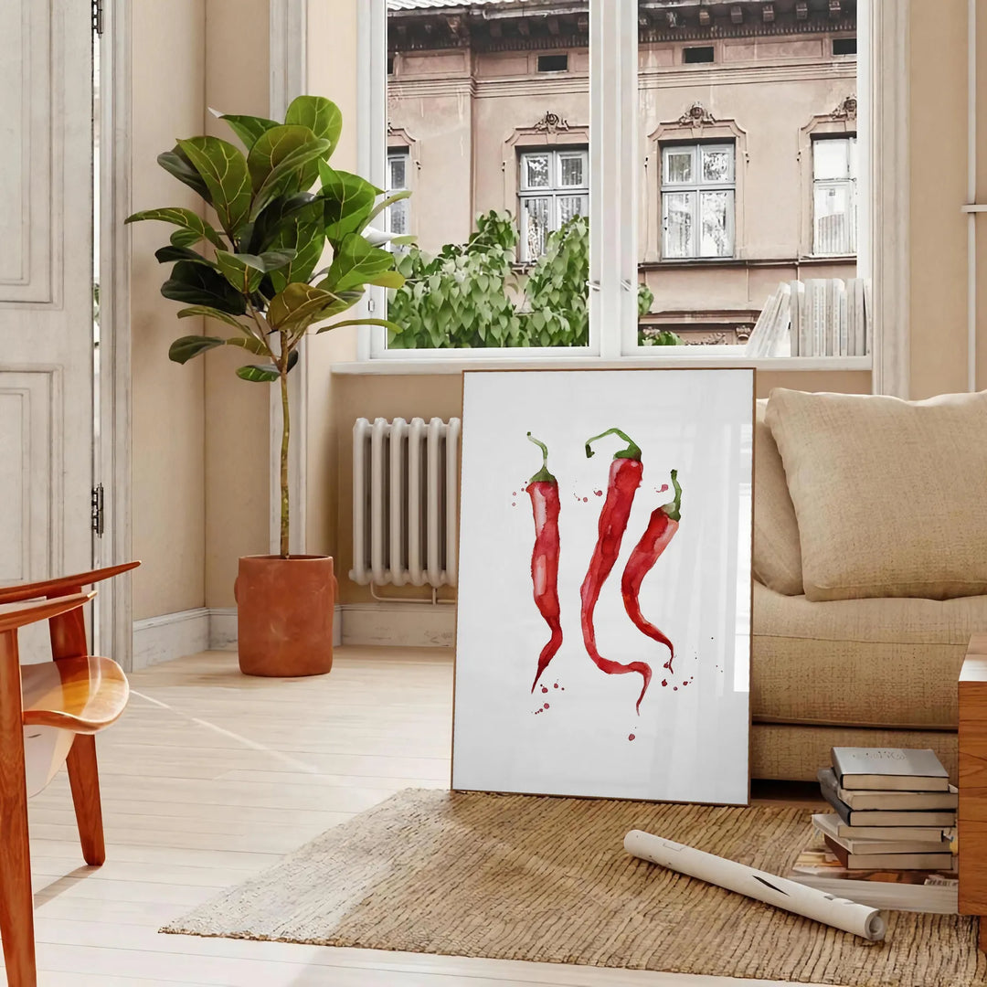 A colorful pepper illustration with rich brown and green tones - in a Parisian living room with a sofa and a fig plant