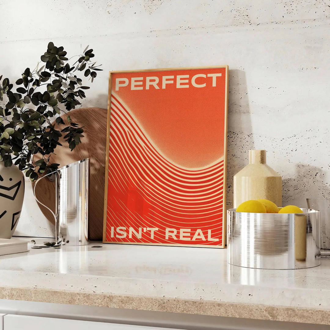 Abstract design with motivational text in orange and red hues - styled on a counter with eucalyptus and a bowl of lemons