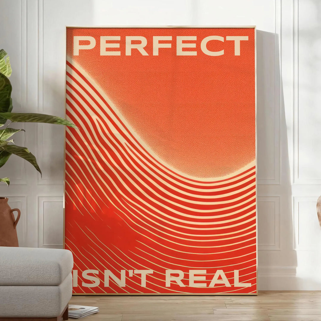 Abstract design with motivational text in orange and red hues - in a bright minimalist room with a plant and an armchair