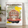 Illustration of Philadelphia skyline with green and brown tones - in a bright minimalist room with a plant and an armchair