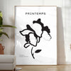 Botanical illustration featuring graceful plant designs in gray and black tones - in a bright minimalist room with a plant and an armchair