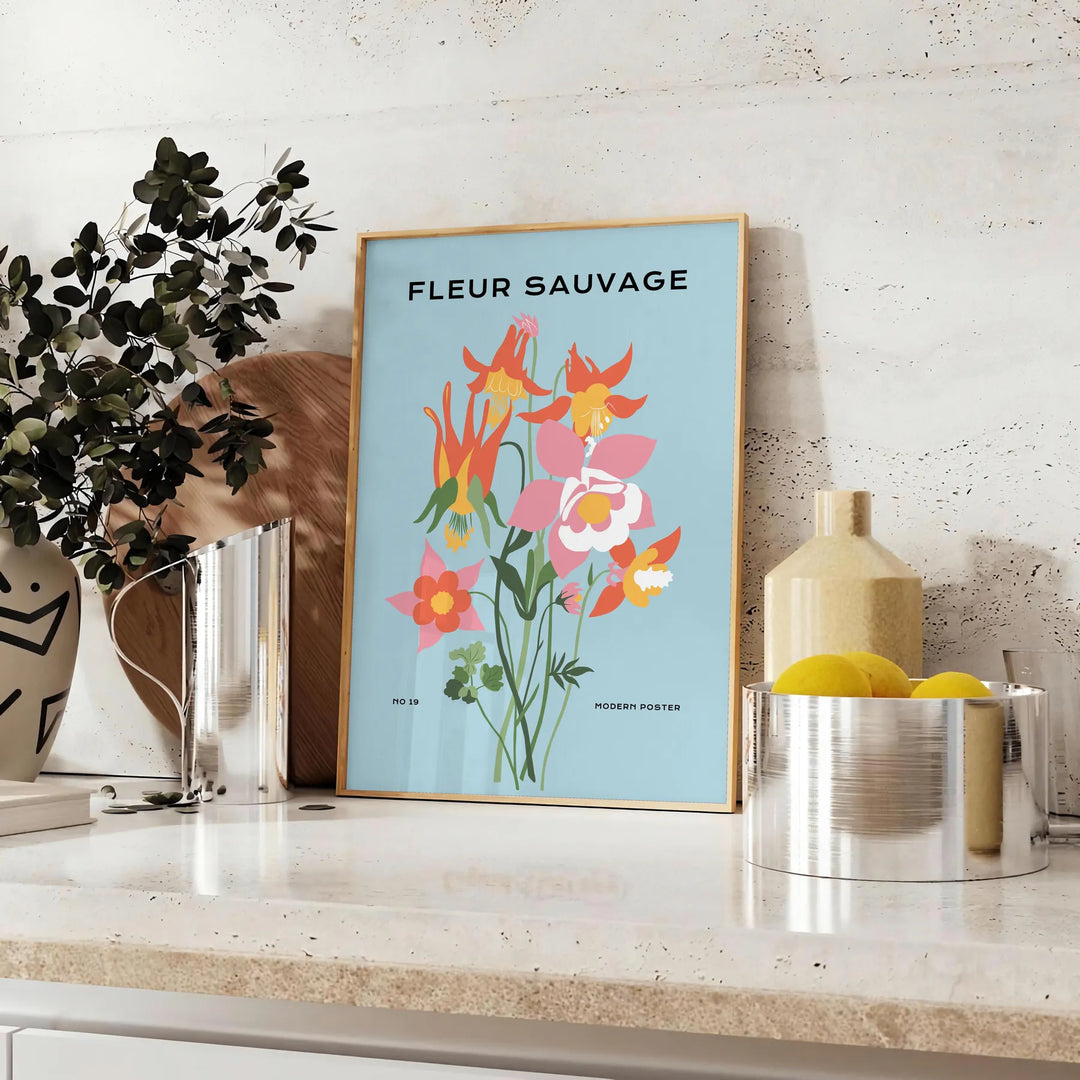 A lush green plant illustration with blue accents against a light background - styled on a counter with eucalyptus and a bowl of lemons