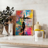 Bold pop art poster featuring abstract shapes in green and blue tones - styled on a counter with eucalyptus and a bowl of lemons