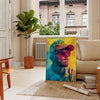 Colorful pop art design featuring dynamic shapes and patterns in green and blue - in a Parisian living room with a sofa and a fig plant