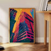 Dynamic pop art design with orange and blue hues, featuring abstract shapes - beside a round wooden side table with books