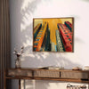 Bold black and orange pop art design featuring abstract shapes - styled on a counter with eucalyptus and a bowl of lemons
