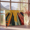 Bold black and orange pop art design featuring abstract shapes - beside a round wooden side table with books