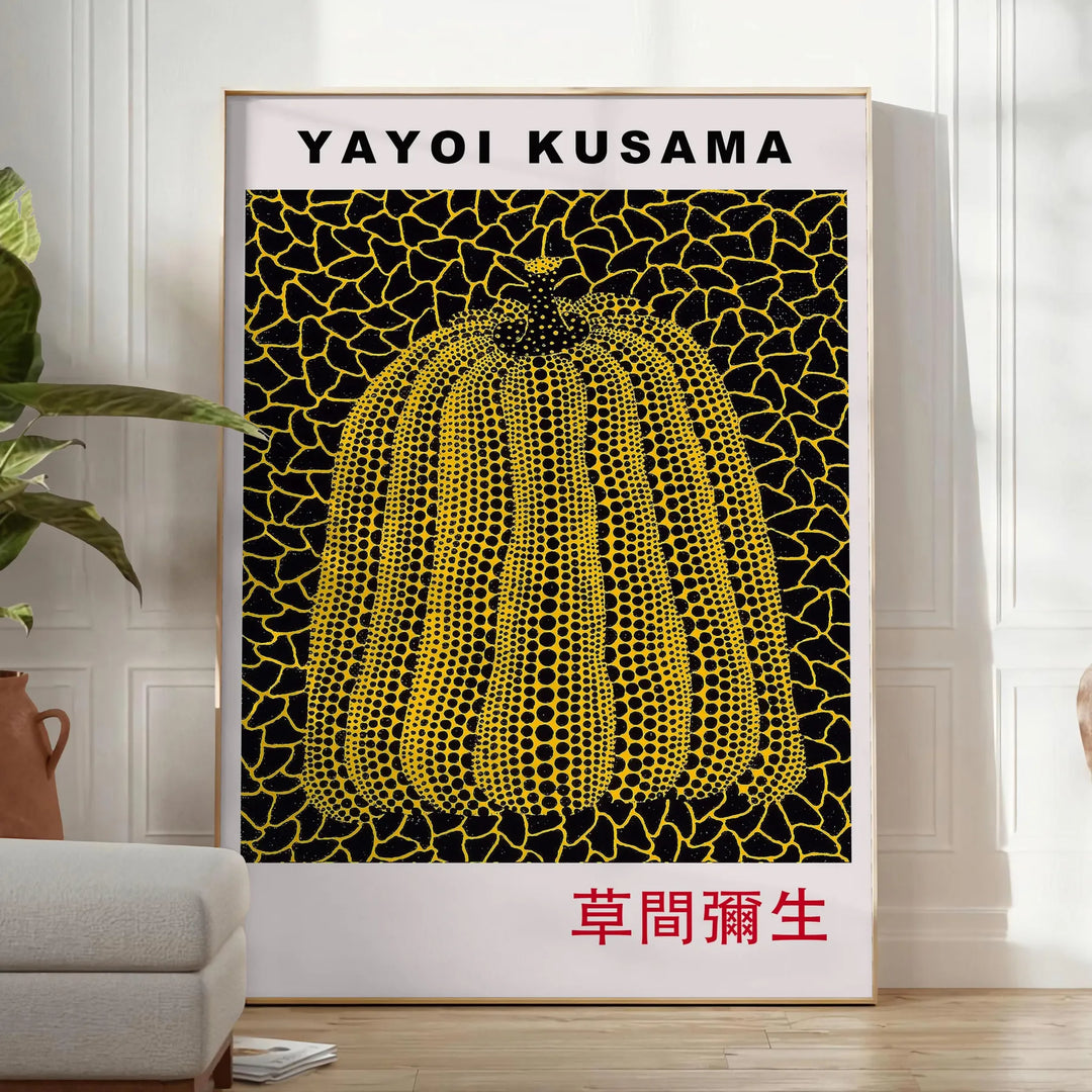 Yellow pumpkin with black polka dots in Yayoi Kusama's signature style - in a bright minimalist room with a plant and an armchair