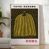 Yellow pumpkin with black polka dots in Yayoi Kusama's signature style - in a bright minimalist room with a plant and an armchair