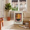 Illustration of a ramen kitchen with bold black and orange colors - in a Parisian living room with a sofa and a fig plant