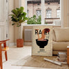 Illustration of a ramen kitchen with black and brown tones - in a Parisian living room with a sofa and a fig plant
