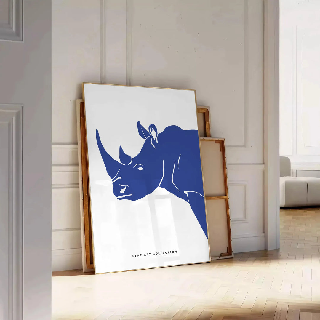A rhinoceros standing in a natural habitat with blue and black tones - leaning on a herringbone floor against a white panelled wall