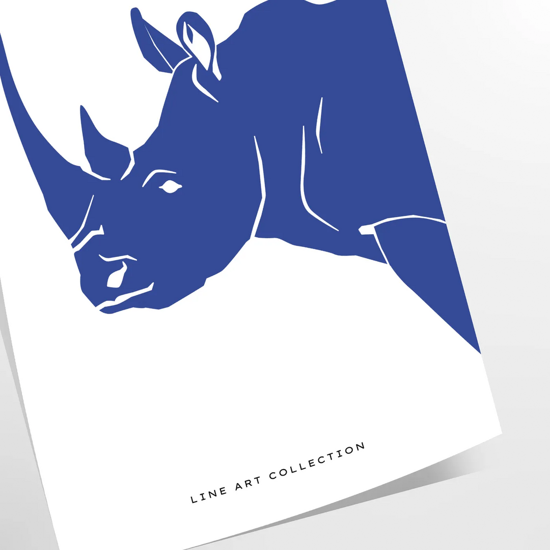 A rhinoceros standing in a natural habitat with blue and black tones - as a rolled, unframed print