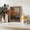 Illustration of Rome's skyline with rich brown and green tones - styled on a counter with eucalyptus and a bowl of lemons