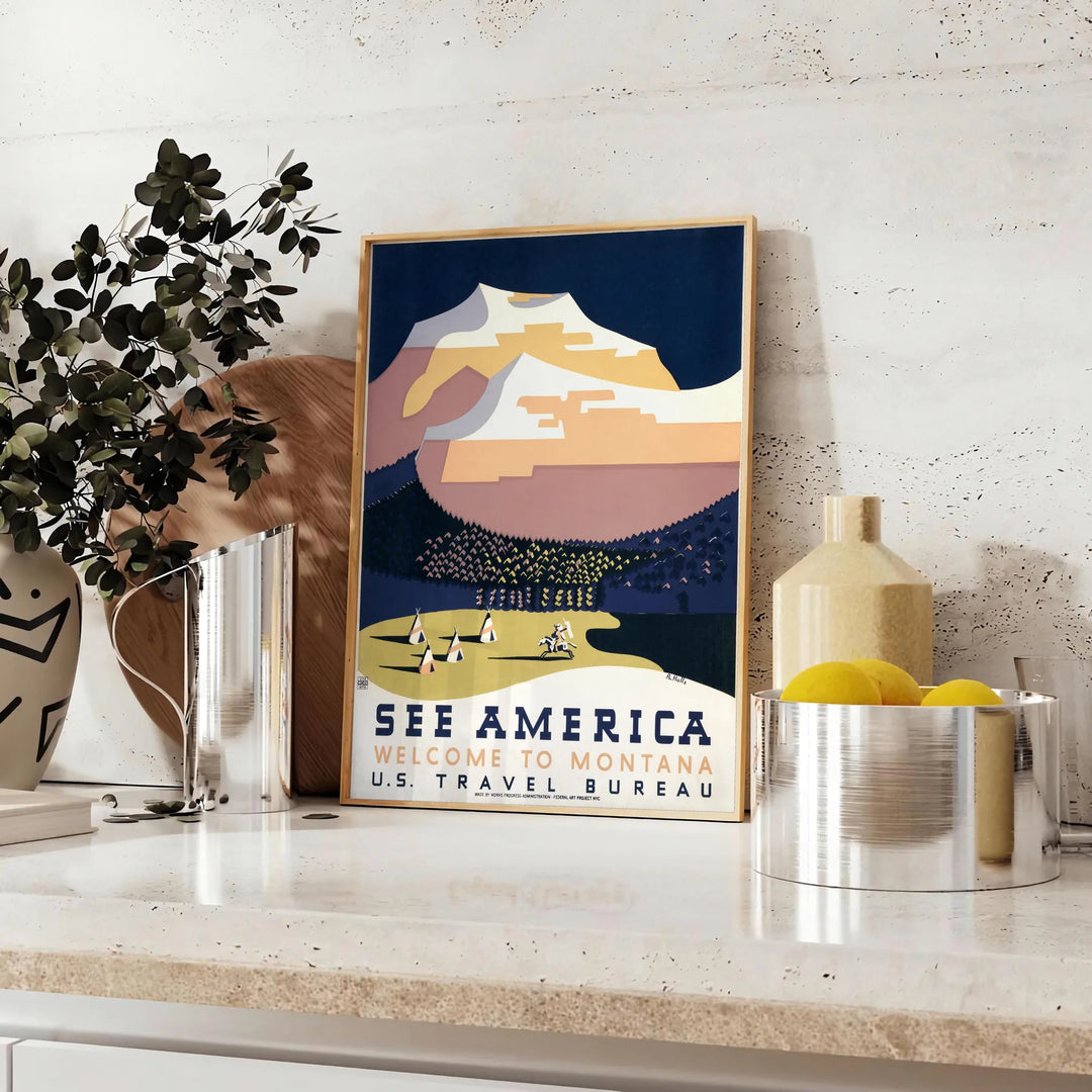 Vintage travel poster featuring a scenic view of America in gray and black tones - styled on a counter with eucalyptus and a bowl of lemons