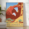 A retro travel poster featuring a yellow and blue landscape with mountains and a road - in a bright minimalist room with a plant and an armchair
