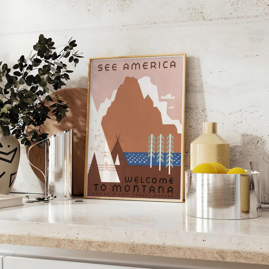 Vintage-style travel poster featuring the USA in muted gray and brown tones - styled on a counter with eucalyptus and a bowl of lemons