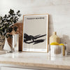 Abstract shapes in black and orange with a bohemian style - styled on a counter with eucalyptus and a bowl of lemons