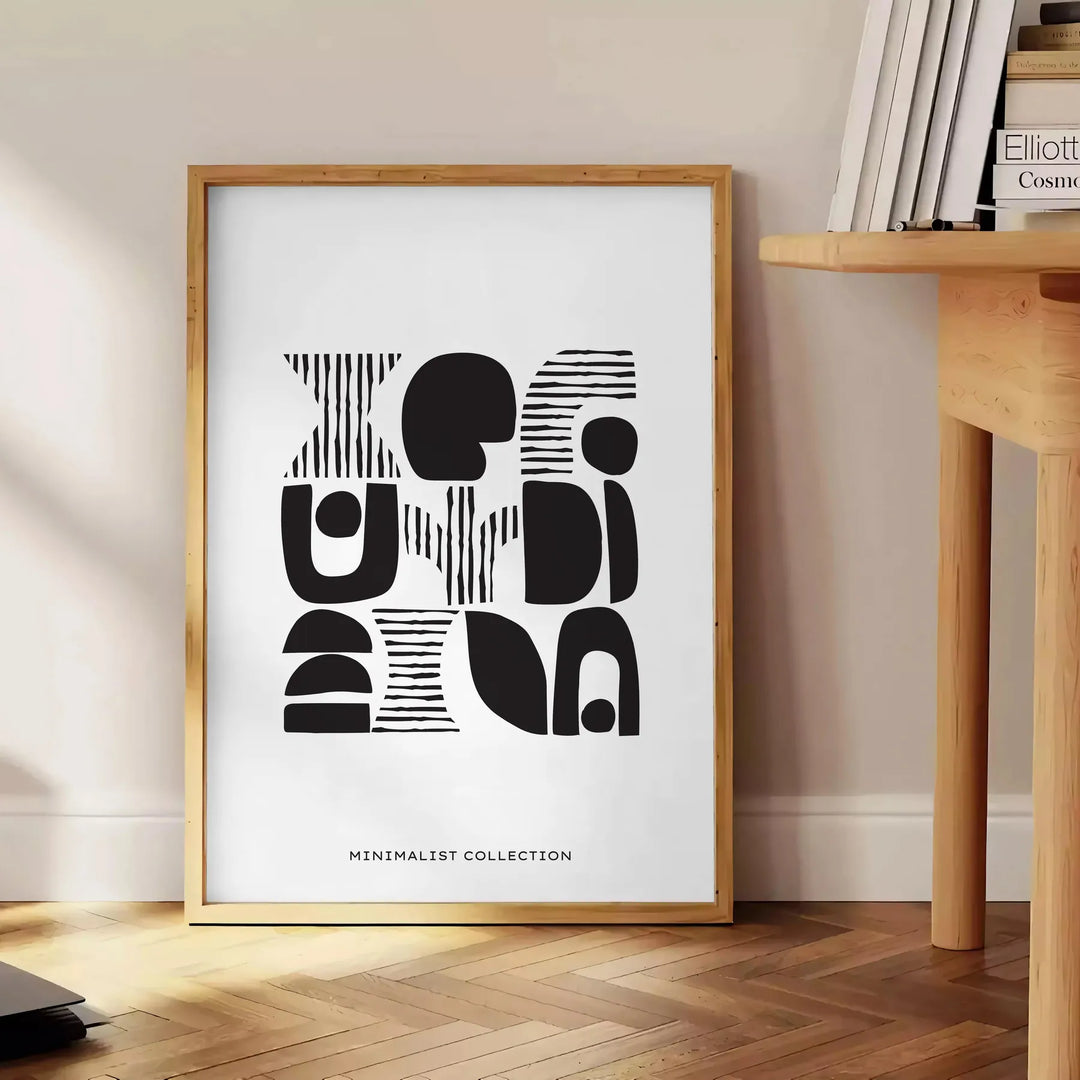 Abstract shapes in a bohemian style with gray and black tones - beside a round wooden side table with books