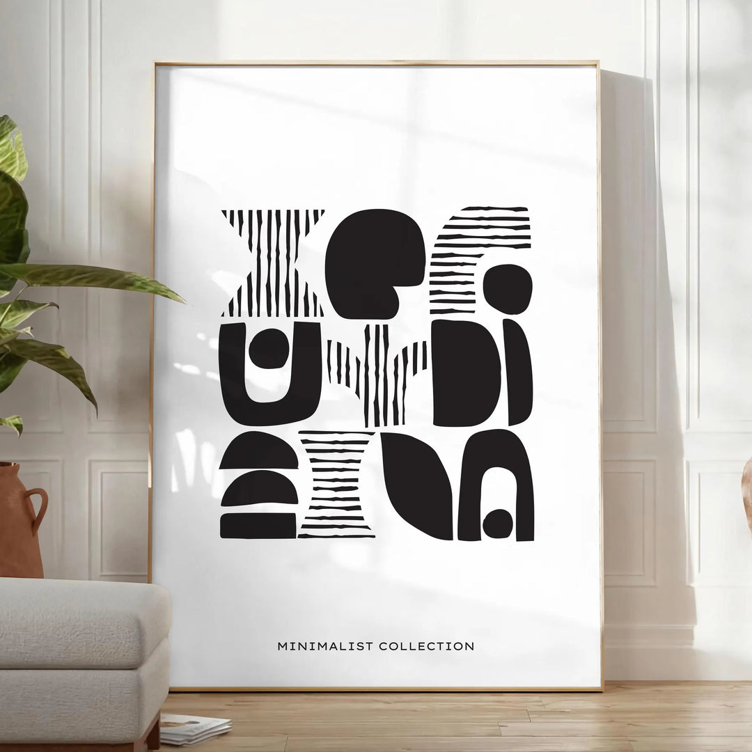 Abstract shapes in a bohemian style with gray and black tones - in a bright minimalist room with a plant and an armchair