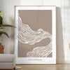Abstract boho art featuring unique shapes in earthy tones - in a bright minimalist room with a plant and an armchair