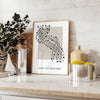 Intricate boho shapes in earthy tones on a textured background - styled on a counter with eucalyptus and a bowl of lemons