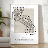 Intricate boho shapes in earthy tones on a textured background - in a bright minimalist room with a plant and an armchair