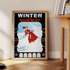 A minimalist ski travel poster featuring a snowy mountain landscape in gray and black tones - beside a round wooden side table with books